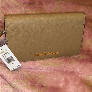 **SOLD**Mk jet set travel slim bifold wallet